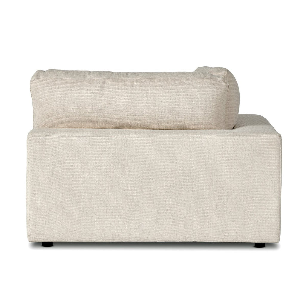 Beige sectional sofa on a white background