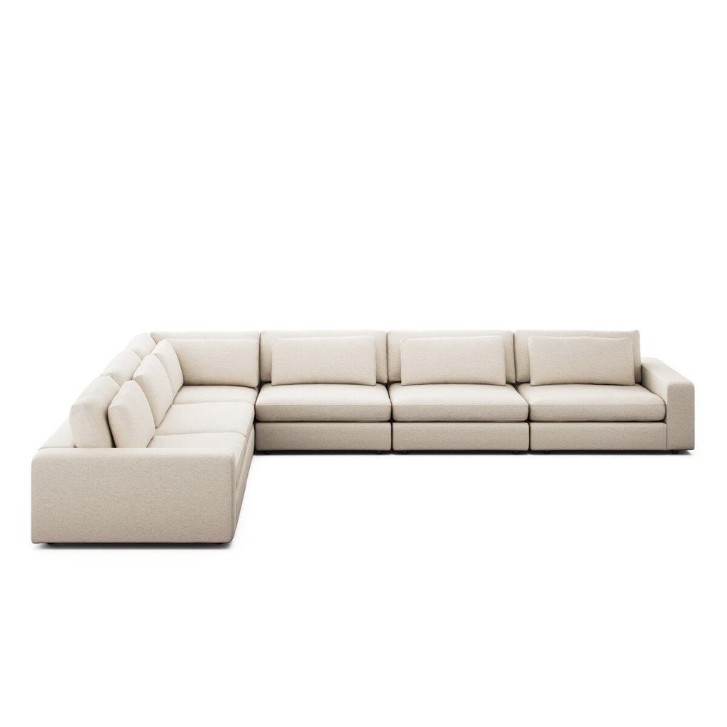 Beige sectional sofa on a white background
