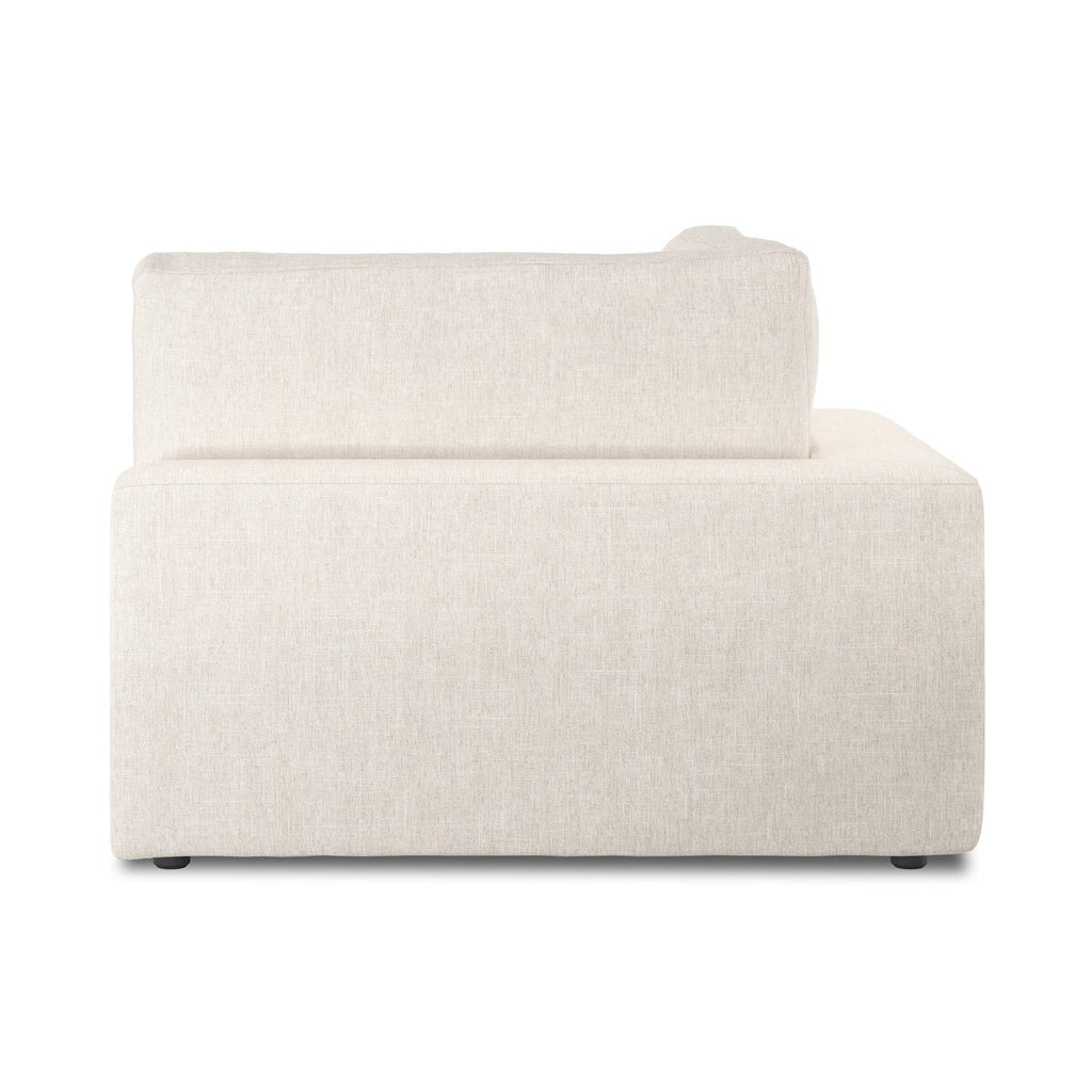 Beige sectional sofa on a white background