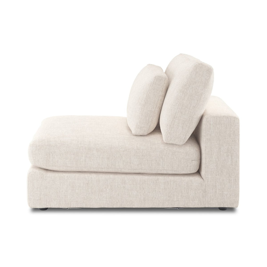 Beige sofa with decorative cushions on a white background