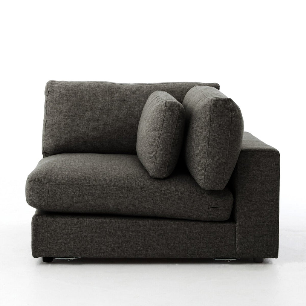 Gray corner sofa with cushions on a white background