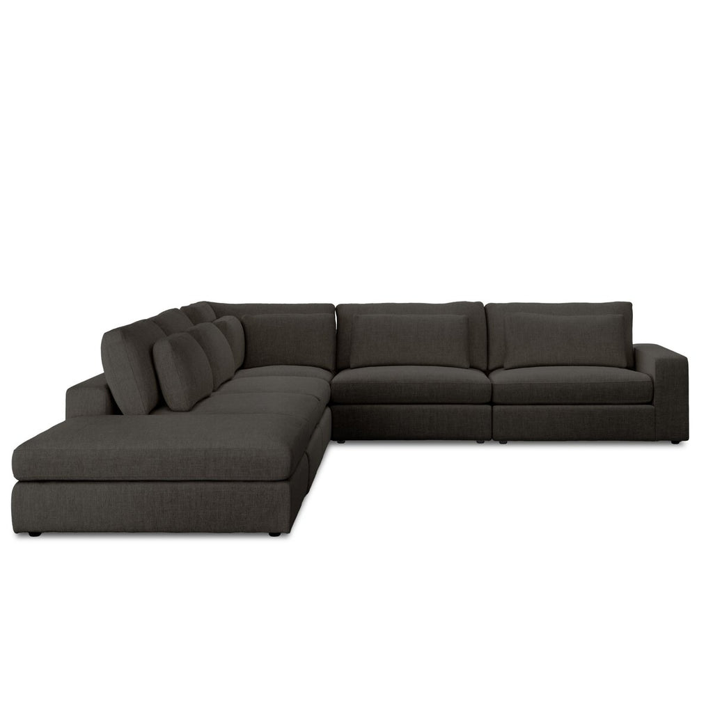Dark gray sectional sofa on a white background
