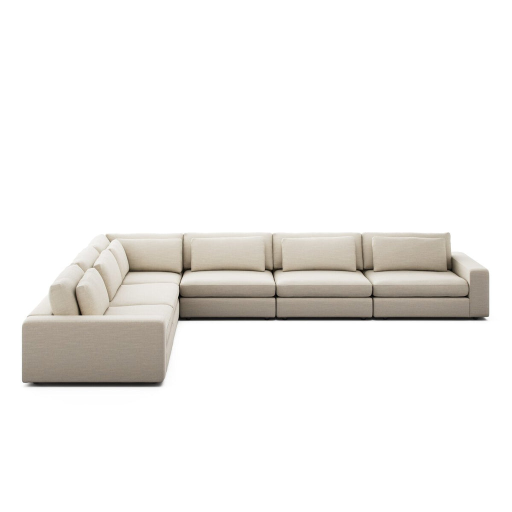 Beige sectional sofa on a white background