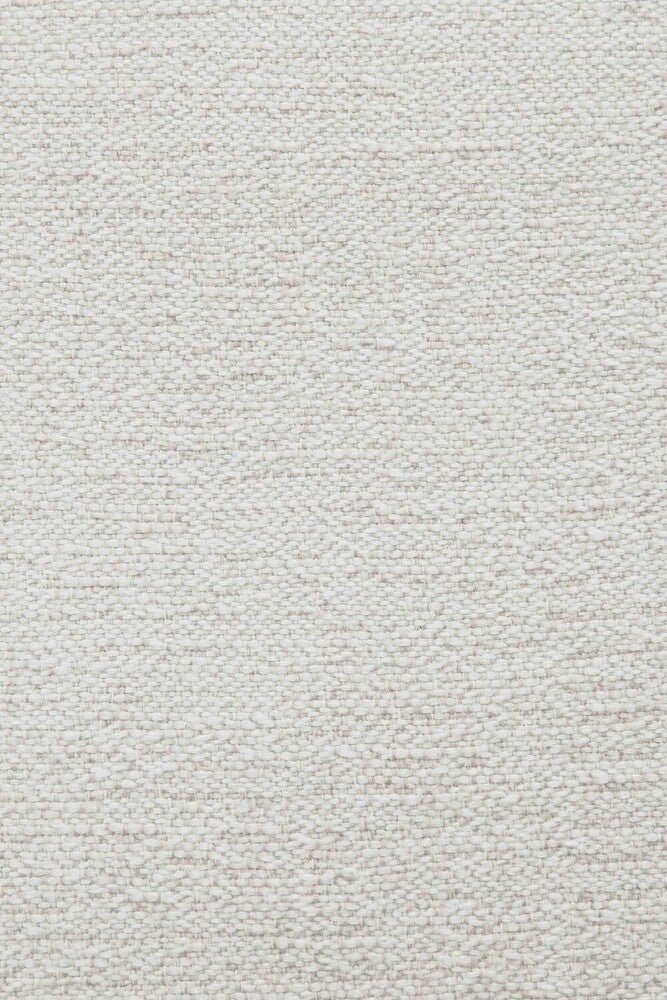 Close-up of a textured light gray fabric surface