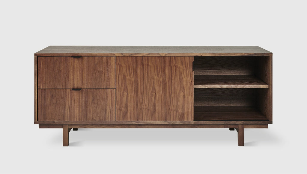 Wooden sideboard with open shelves on a white background