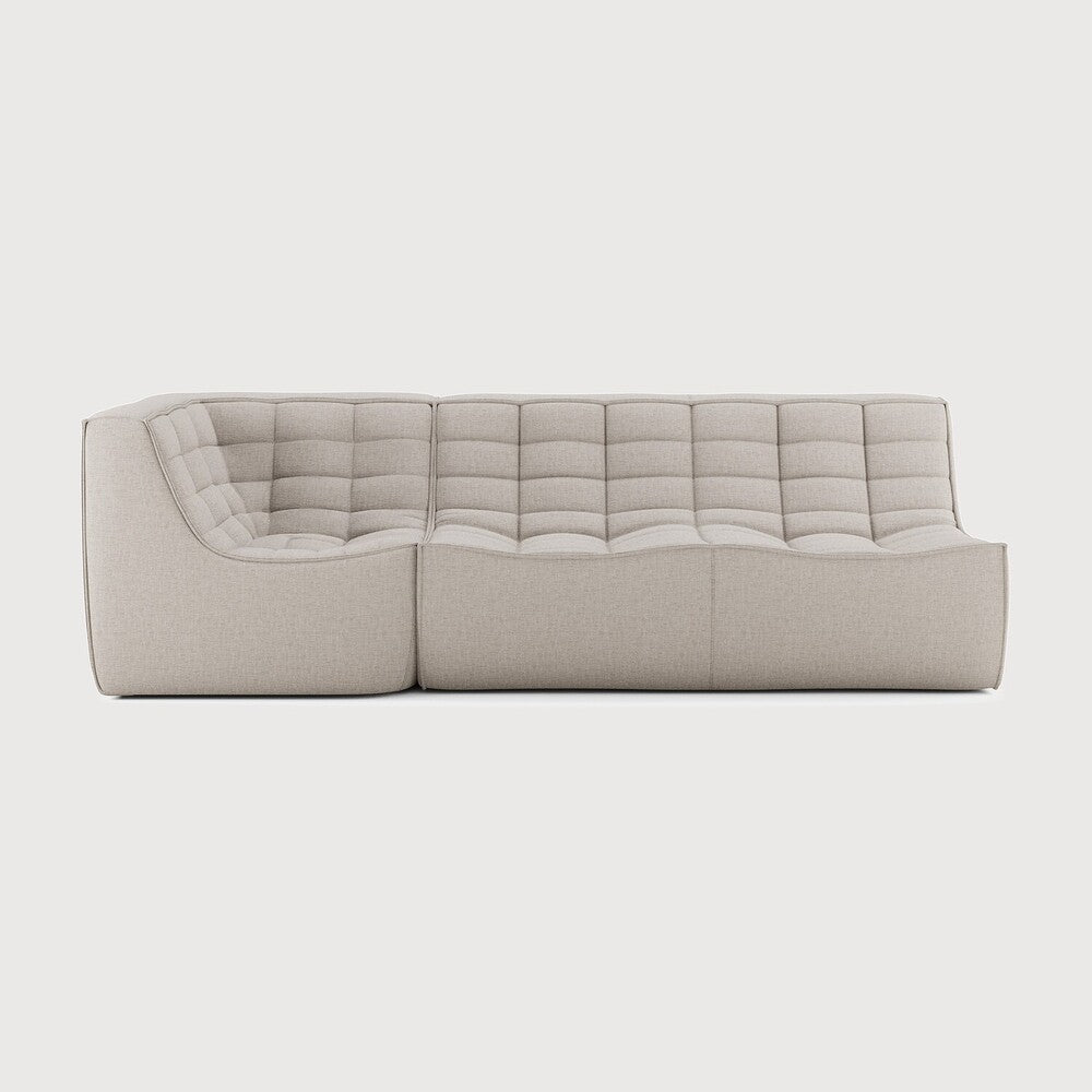 Beige sectional sofa on a white background