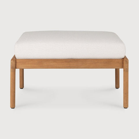 Wooden ottoman with a white cushion on a light gray background