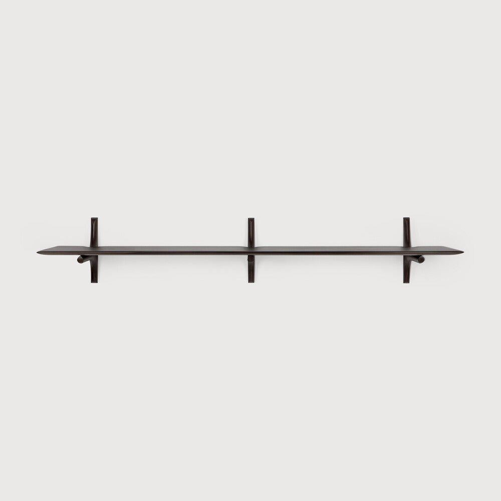 Black metal shelf with three brackets on a white background