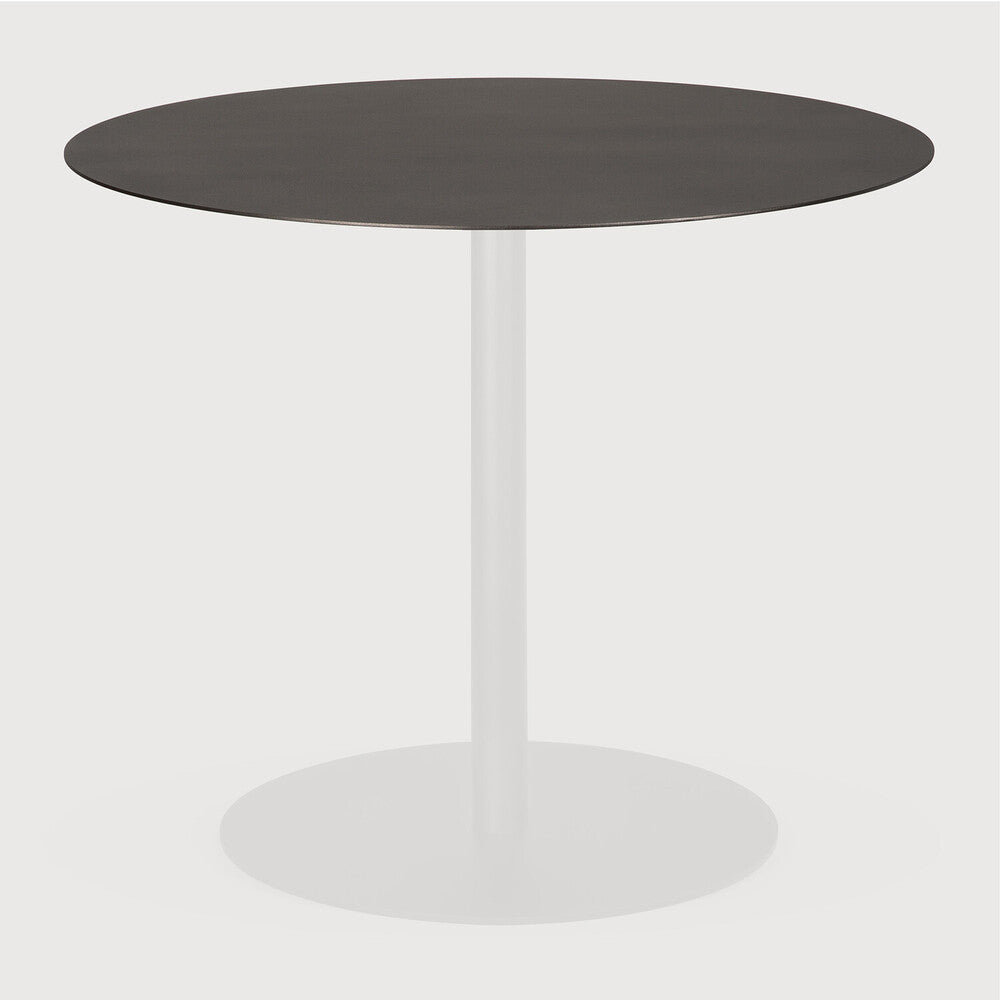 Round table with a dark brown top and white base on a light gray background